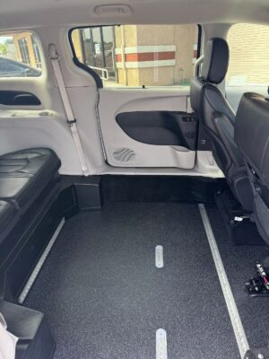 White Chrysler Pacifica with Driverge Side Entry Automatic Fold Out conversion