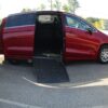 Red Chrysler Pacifica with Driverge Side Entry Automatic Fold Out conversion