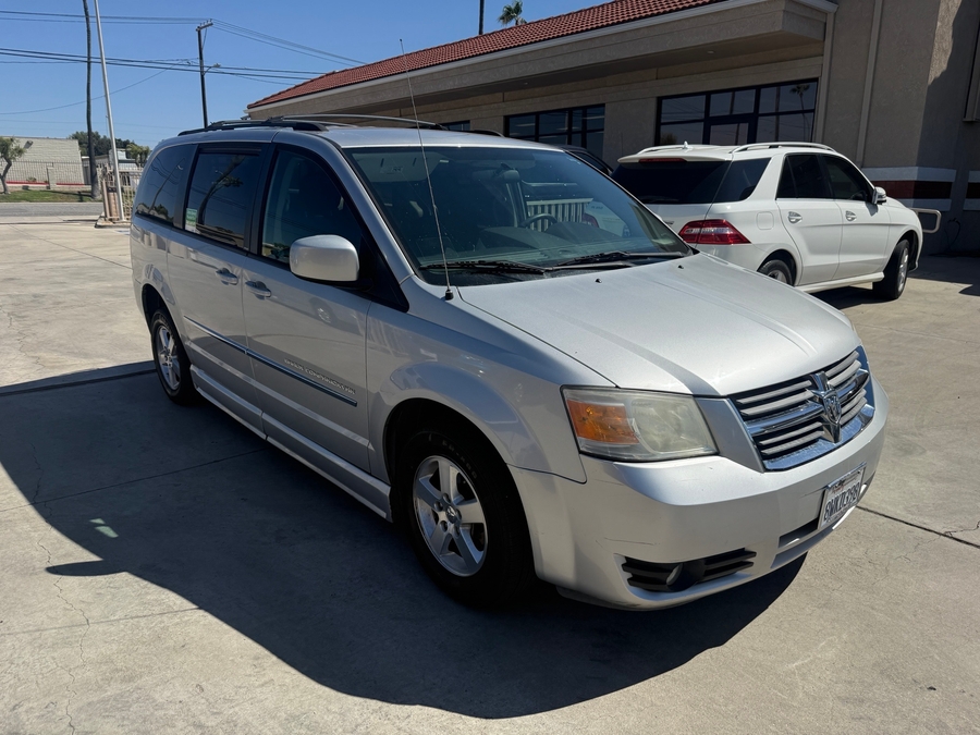 Silver Dodge Grand Caravan with BraunAbility Side Entry Manual Fold Out conversion