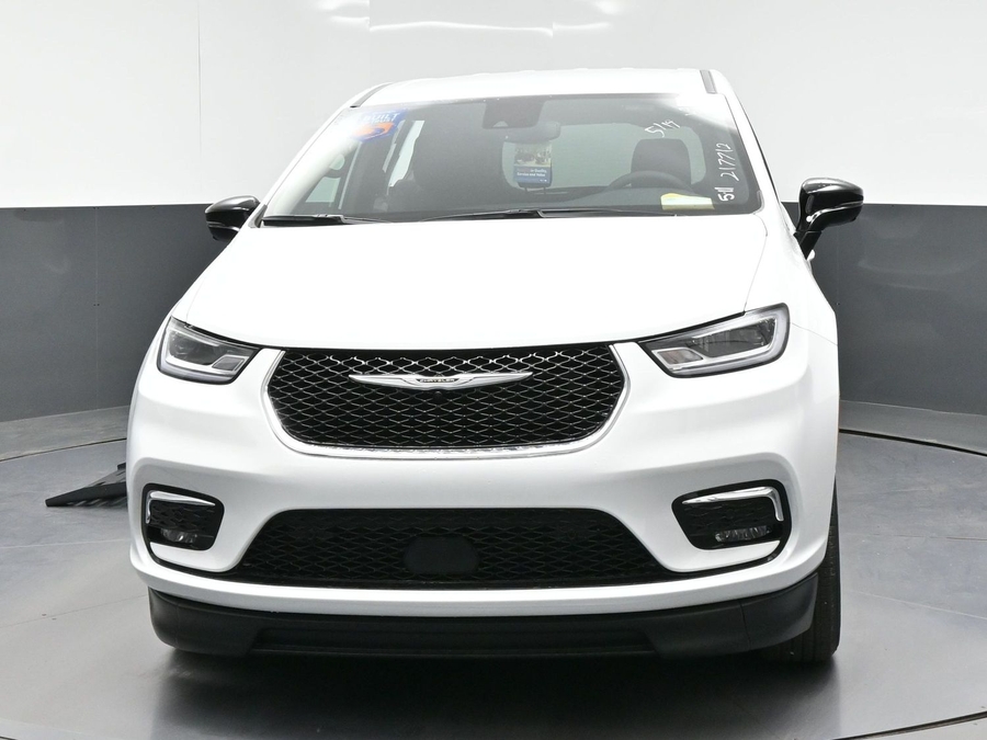 White Chrysler Pacifica with BraunAbility Side Entry Automatic Fold Out conversion