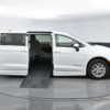 White Chrysler Voyager with BraunAbility Side Entry Automatic Fold Out conversion