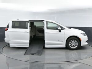 White Chrysler Voyager with BraunAbility Side Entry Automatic Fold Out conversion