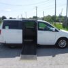 White Dodge Grand Caravan with Driverge Side Entry Automatic Fold Out conversion