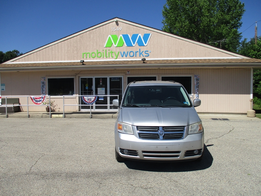 Silver Dodge Grand Caravan with Vantage Mobility Side Entry Automatic In Floor conversion
