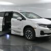 White Honda Odyssey with BraunAbility Side Entry Automatic In Floor conversion