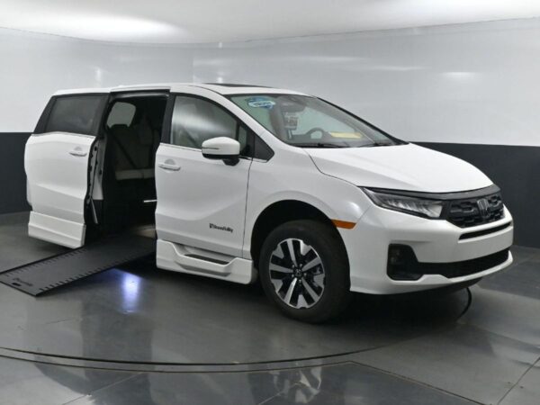 White Honda Odyssey with BraunAbility Side Entry Automatic In Floor conversion