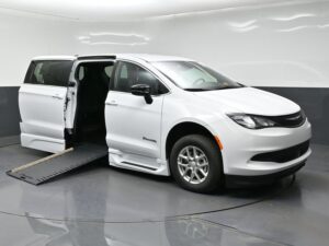 White Chrysler Voyager with BraunAbility Side Entry Automatic In Floor conversion