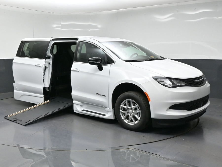 White Chrysler Voyager with BraunAbility Side Entry Automatic In Floor conversion