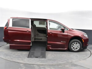 Red Chrysler Voyager with BraunAbility Side Entry Automatic Fold Out conversion