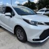 White Toyota Sienna with Driverge Rear Entry Manual Fold Out conversion