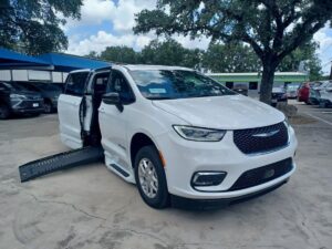 White Chrysler Pacifica with BraunAbility Side Entry Automatic Fold Out conversion