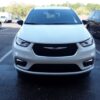 White Chrysler Pacifica with BraunAbility Side Entry Automatic Fold Out conversion