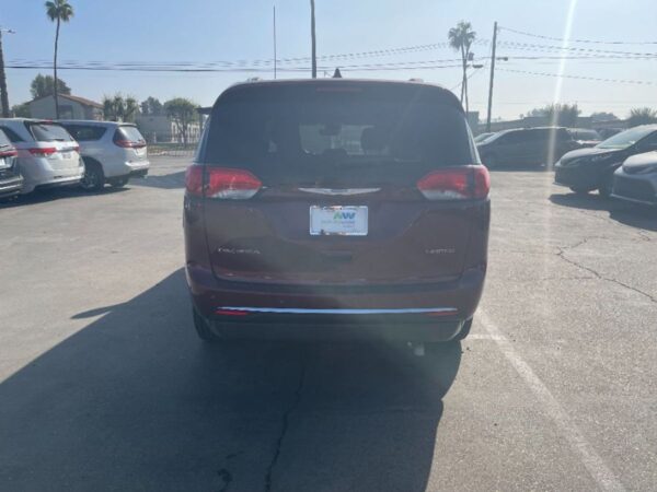 Red Chrysler Pacifica with Vantage Mobility Side Entry Automatic In Floor conversion