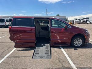 Red Chrysler Voyager with BraunAbility Side Entry Automatic Fold Out conversion