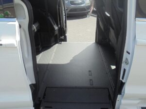 White Chrysler Pacifica with BraunAbility Side Entry Automatic In Floor conversion
