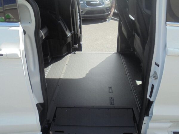White Chrysler Pacifica with BraunAbility Side Entry Automatic In Floor conversion