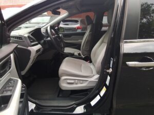 Black Honda Odyssey with BraunAbility Side Entry Automatic In Floor conversion