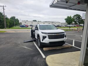White Chevrolet Traverse with BraunAbility Side Entry Automatic In Floor conversion