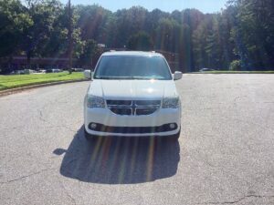 White Dodge Grand Caravan with BraunAbility Side Entry Automatic Fold Out conversion