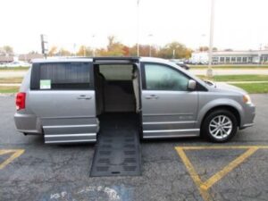Silver Dodge Grand Caravan with BraunAbility Side Entry Automatic Fold Out conversion