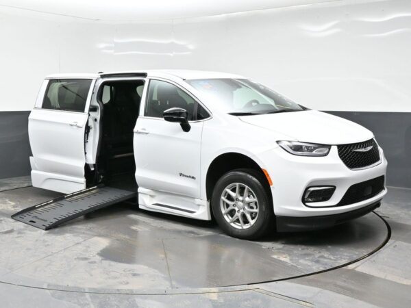 White Chrysler Pacifica with BraunAbility Side Entry Automatic Fold Out conversion