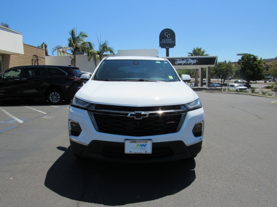 White Chevrolet Traverse with BraunAbility Side Entry Automatic In Floor conversion