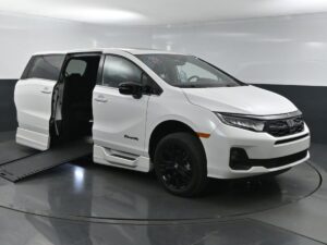 White Honda Odyssey with BraunAbility Side Entry Automatic In Floor conversion