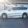 Silver Chrysler Pacifica with BraunAbility Side Entry Automatic Fold Out conversion