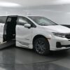 White Honda Odyssey with BraunAbility Side Entry Automatic In Floor conversion