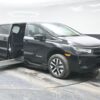 Black Honda Odyssey with BraunAbility Side Entry Automatic In Floor conversion