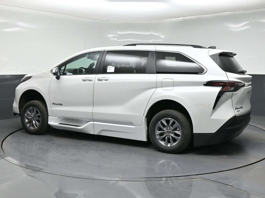 White Toyota Sienna with BraunAbility Side Entry Automatic In Floor conversion