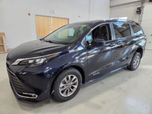 Blue Toyota Sienna with Driverge Rear Entry Manual Fold Out conversion