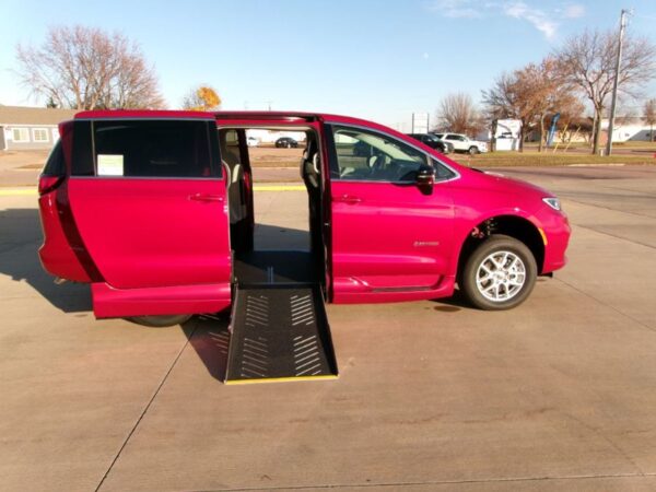 Red Chrysler Pacifica with Driverge Side Entry Automatic Fold Out conversion