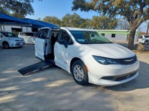 White Chrysler Voyager with Driverge Side Entry Automatic Fold Out conversion