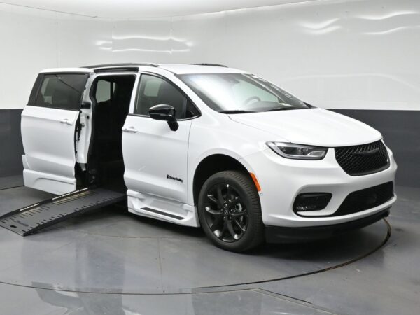 White Chrysler Pacifica with BraunAbility Side Entry Automatic Fold Out conversion