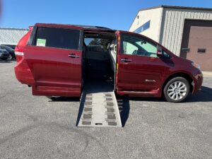 Red Toyota Sienna with BraunAbility Side Entry Automatic Fold Out conversion