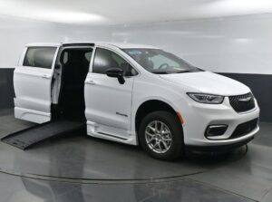White Chrysler Pacifica with BraunAbility Side Entry Automatic Fold Out conversion