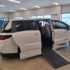White Honda Odyssey with BraunAbility Side Entry Automatic In Floor conversion