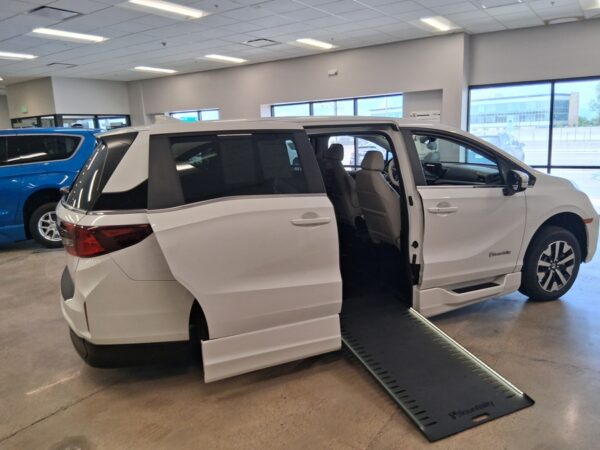 White Honda Odyssey with BraunAbility Side Entry Automatic In Floor conversion