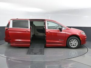 Red Chrysler Pacifica with BraunAbility Side Entry Automatic Fold Out conversion