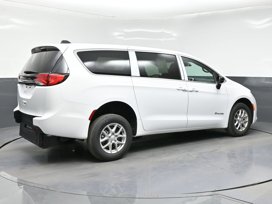 White Chrysler Voyager with BraunAbility Rear Entry Manual Fold Out conversion