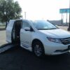 White Honda Odyssey with BraunAbility Side Entry Automatic Fold Out conversion