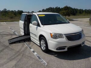 White Chrysler Town and Country with BraunAbility Side Entry Automatic Fold Out conversion