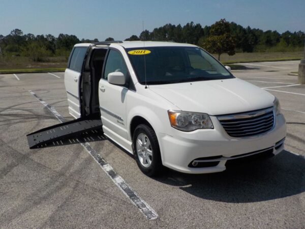 White Chrysler Town and Country with BraunAbility Side Entry Automatic Fold Out conversion