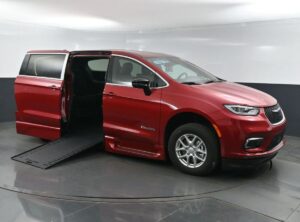 Red Chrysler Pacifica with BraunAbility Side Entry Automatic In Floor conversion
