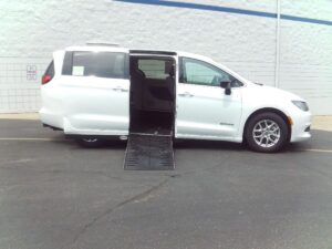 White Chrysler Voyager with Driverge Side Entry Automatic Fold Out conversion