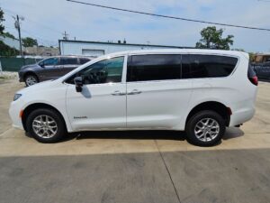 White Chrysler Pacifica with BraunAbility Rear Entry Manual Fold Out conversion