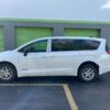 White Chrysler Voyager with Driverge Side Entry Automatic Fold Out conversion