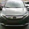 Green Honda Odyssey with Vantage Mobility Side Entry Automatic In Floor conversion