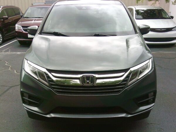 Green Honda Odyssey with Vantage Mobility Side Entry Automatic In Floor conversion